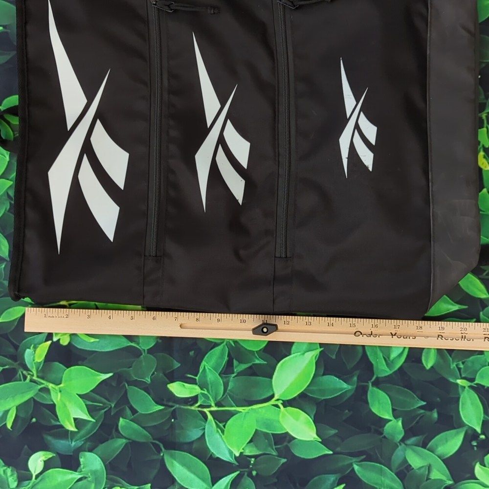 Black Reebok Backpack With Unique Tiered Zipper Pocket Design - Picture 13 of 15